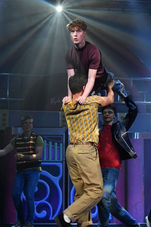 In order to make the original musical suitable for young performers and audiences, Jim Jacobs decided to write a &quot;school version&quot; of the musical. This edition eliminates all of the references to cigarettes and alcohol, and also any swearing or bad language. Most of the songs have also undergone changes as well; the numbers are all shortened greatly and edited for content/language. Some plot lines are missing from the school version, such as Rizzo&#39;s pregnancy and her song &quot;There Are Worse Things I Could Do&quot; and &quot;Hopelessly Devoted&quot;. This section is entirely cut from the script and score. The beginning of the pajama party in Marty&#39;s bedroom is also cut. (In this version, the Pink Ladies do not offer Sandy cigarettes or wine. Instead it begins directly with piercing her ears.) Overall, this version is considered to be G-rated